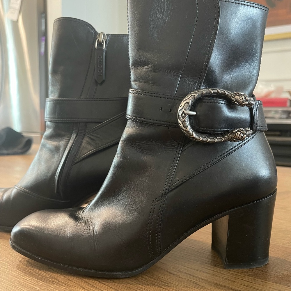 Gucci Black Booties with zip closure and belt detailing